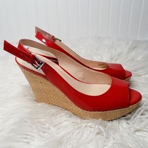 Mocassin noir u en simili daim à pompon